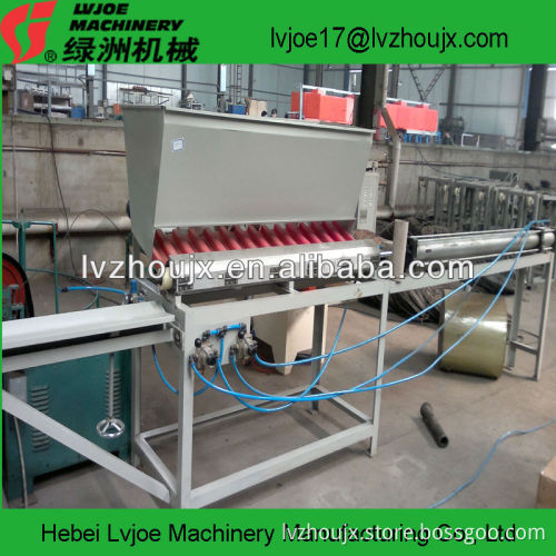pneumatic machine for loading and unloading paper cores